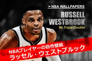 デンバー・ナゲッツのユニフォームを着たラッセル・ウェストブルック、集中した表情でドリブルする壁紙